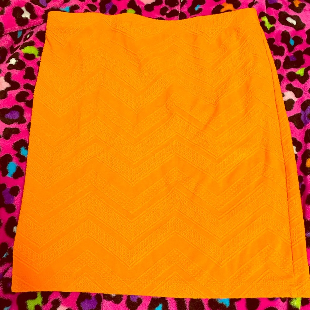 A Bright Orange Mini Skirt